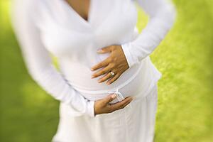 Pregnant Woman in Outdoor Setting