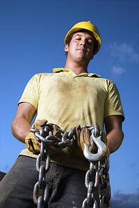 Construction Worker Holding Chain