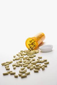 Pills Spilling From Bottle
