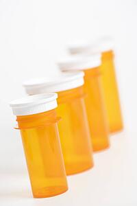 Empty Yellow Medicine Bottles