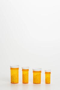 Yellow Medicine Bottles With Pills