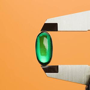 Green Capsule in Caliper