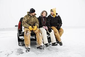 Three People Having a Beer