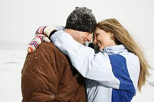 Couple Hugging in Snow