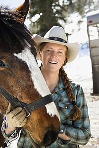 Attractive Young Woman Wearing Cowboy Hat