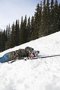 Skier Lying in Snow