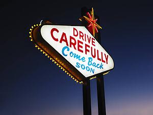 Leaving Las Vegas Sign at Night