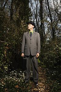Young Businessman in Woods