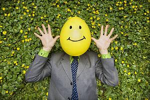 Businessman with Happy Balloon Face