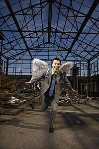 Businessman Wearing Angel Wings