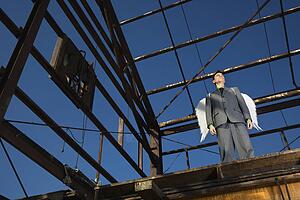 Businessman Wearing Angel Wings