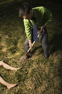 Businessman Burying Dead Body