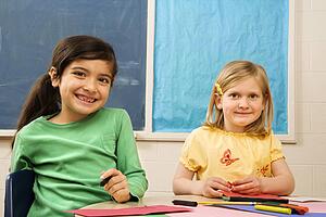 Two Girls in Classroom.