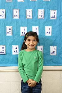 Student at Chalkboard