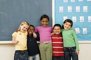 Students Standing in Classroom. 