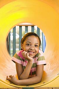 Young Girl at Playground Smiling