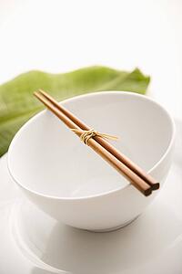 Chopsticks on an Empty Bowl