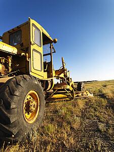 Old Grader in Field