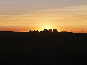 Row of Houses Silhouetted at Sunset