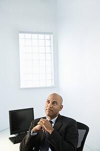 Businessman at office desk.