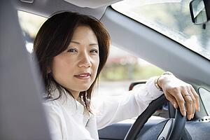 Woman at steering wheel