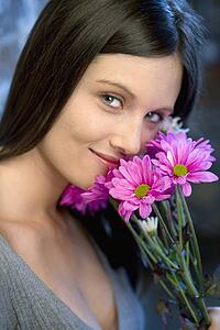 Young woman with flowers