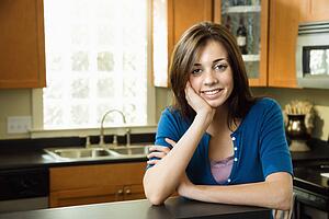 Pretty woman in kitchen