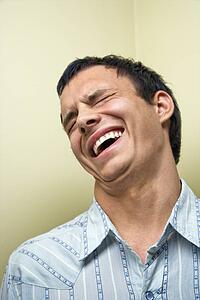 Young man laughing