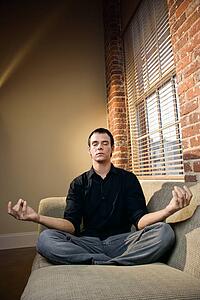 Man in lotus pose