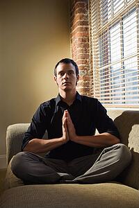 Young man meditating