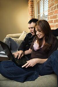 Couple using computer