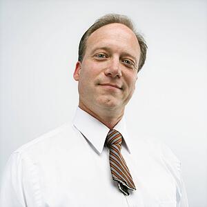 Businessman with cut necktie