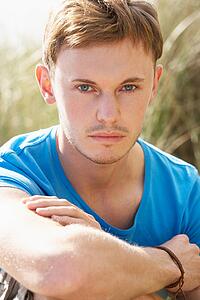 Portrait Of Young Man On Beach