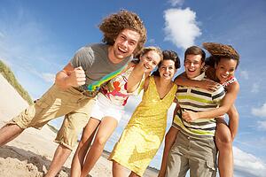 Group Of Friends Having Fun On Summer Beach