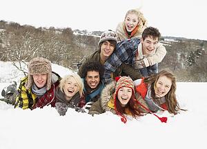Group Of Teenage Friends Having Fun In Snowy Landscape