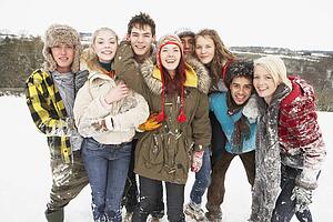 Group Of Teenage Friends Having Fun In Snowy Landscape