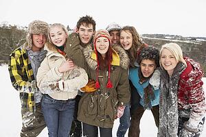 Group Of Teenage Friends Having Fun In Snowy Landscape