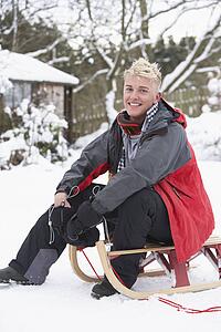 Teenage Boy With Sledge