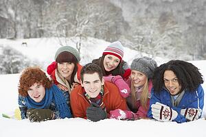 Group Of Teenage Friends Having Fun In Snowy Landscape