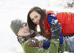 Romantic Teenage Couple Having Fun In Snow