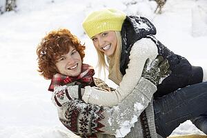 Romantic Teenage Couple Having Fun In Snow