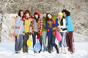 Group Of Teenage Friends Having Fun In Snowy Landscape