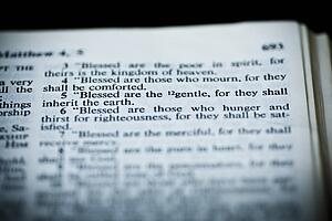 the new american standard bible open to matthew 5: 5, the sermon on the mount (the beatitudes)