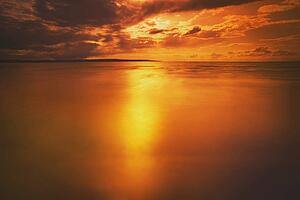 slave lake, alberta, canada; sunset over a lake
