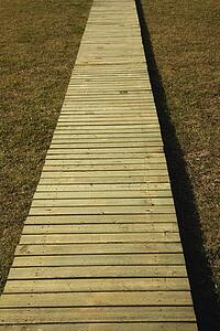 alberta, canada; a wooden sidewalk