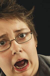 a boy making a silly face