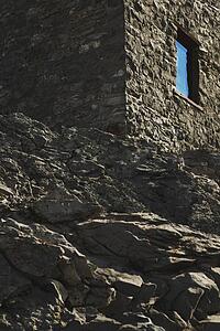 banff, alberta, canada; a rock building on a mountain
