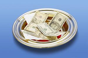 knoxville, tennessee, united states of america; american money in a church offering plate
