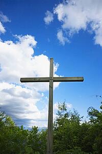 knoxville, tennessee, united states of america; a cross against a blue sky with clouds