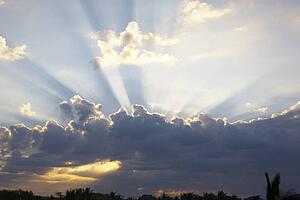 guatemala city, guatemala; sunlight breaks through the clouds